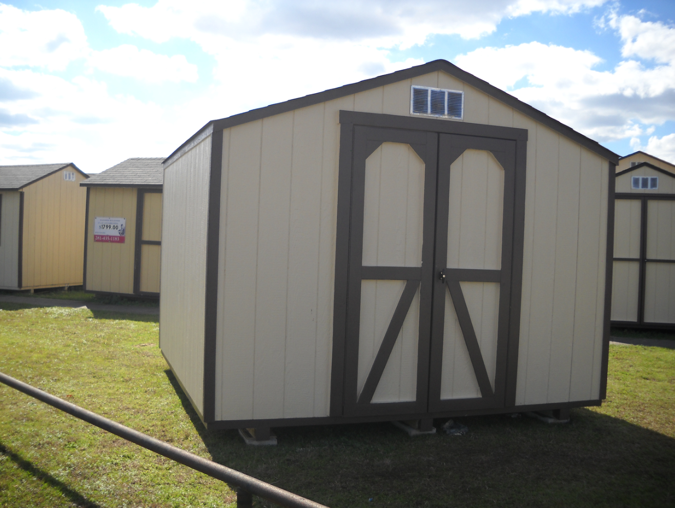 Storage shed - cream with dark trim double doors